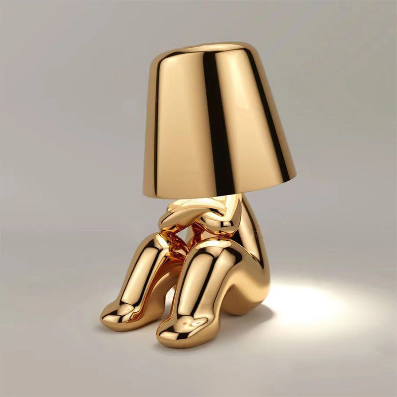 RegalGlow | Golden man table lamp