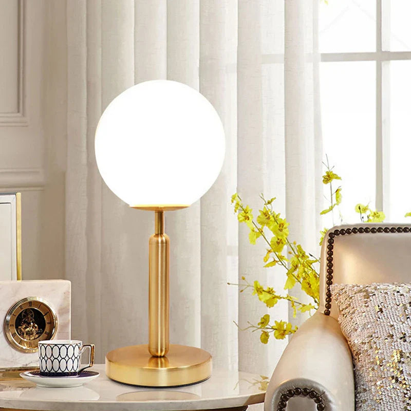 GlowSphere - LED glass ball brass table lamp